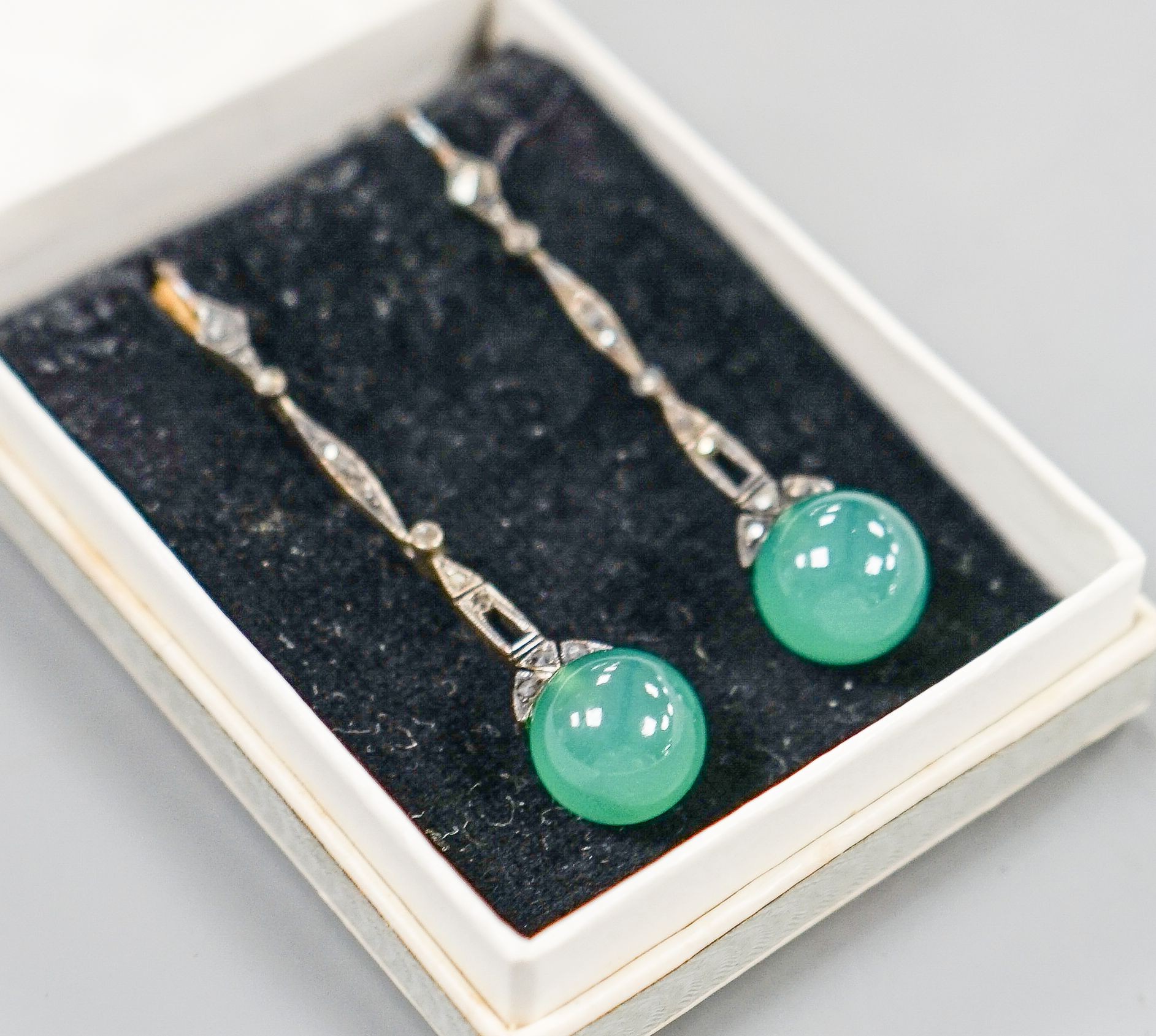 A pair of 1920's/1930's white metal, chrysoprase and marcasite set drop earrings, 52mm.